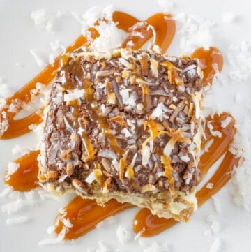 Eclair cake topped with coconut and caramel