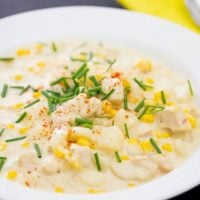 Close-up Chicken Corn Showder with chives in white bowl
