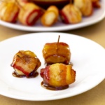 Bacon wrapped water chestnuts on a plate
