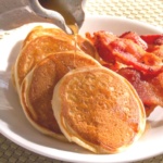 Pancakes and bacon on a plate