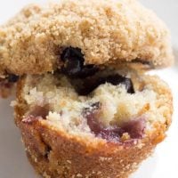 Blueberry Streusel Mini Muffin split open on white plate