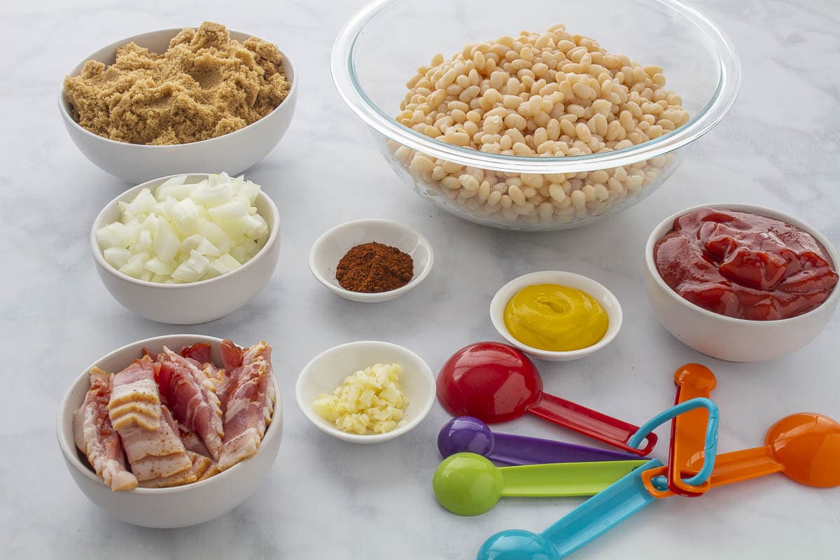 Baked Beans Ingredients in bowls with some measuring spoons