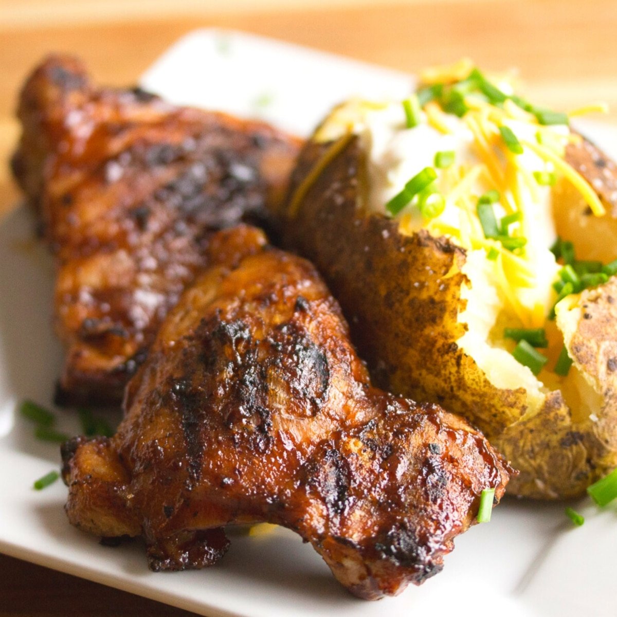 Grilled Chicken on a plate with a potato