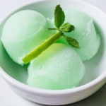 Daiquiri Sorbet with a lime slice and mint spring in a bowl