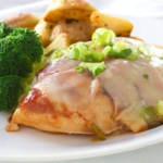 Smoky Mountain Chicken on a plate with broccoli and roasted potatoes