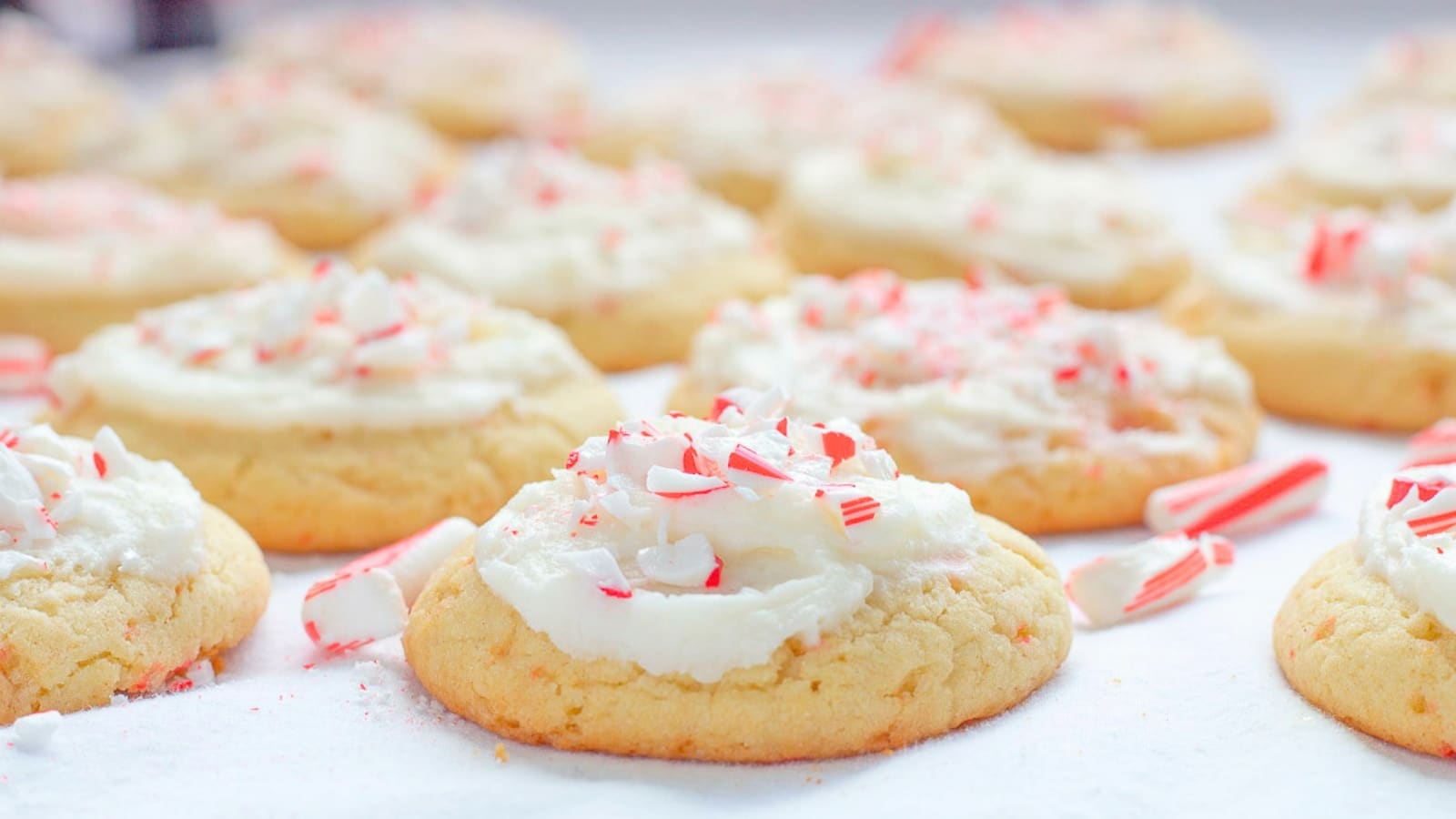 Sugar cookies with frosting and crushed peppermint