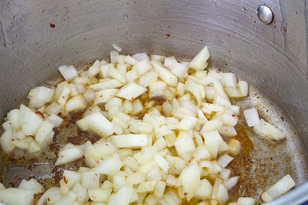Onions and bacon fat in a pan