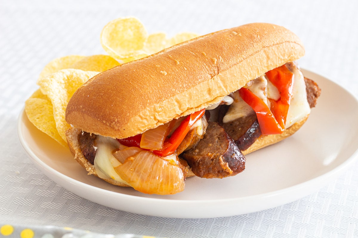 Sausage and peppers sandwich on a plate