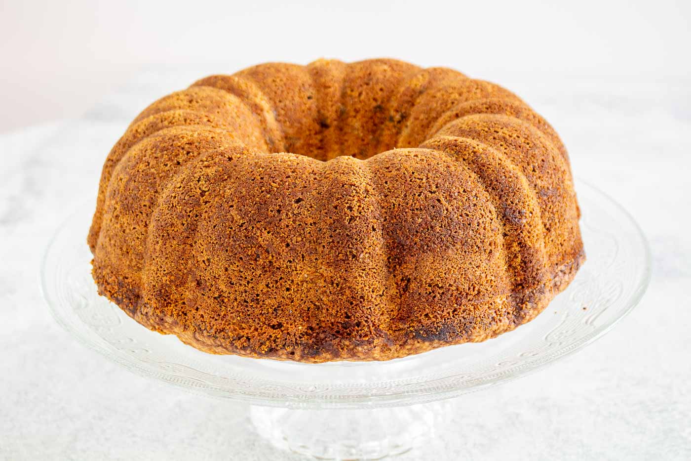 Bundt Cake on a glass cake plate