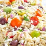 Orzo pasta salad with tomatoes, olives, and cucumbers