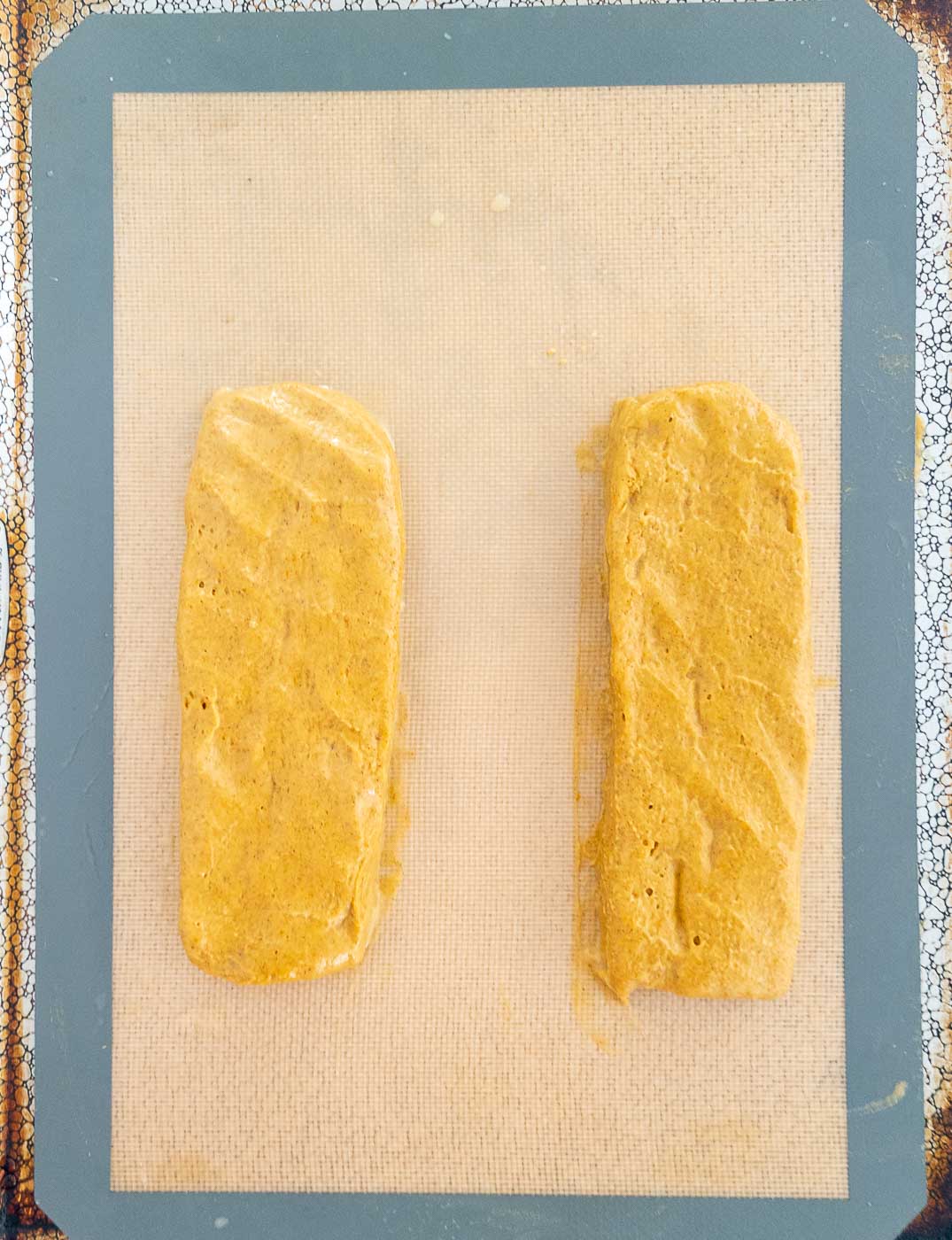 Biscotti dough formed into logs