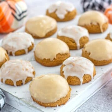 Soft cakey pumpkin cookies on a tray