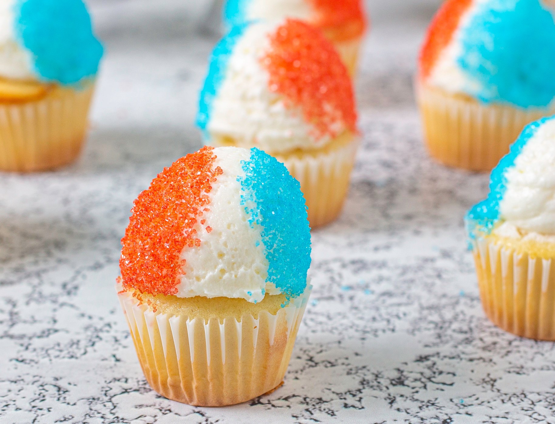 Mini Vanilla cupcake decorated like a snow cone
