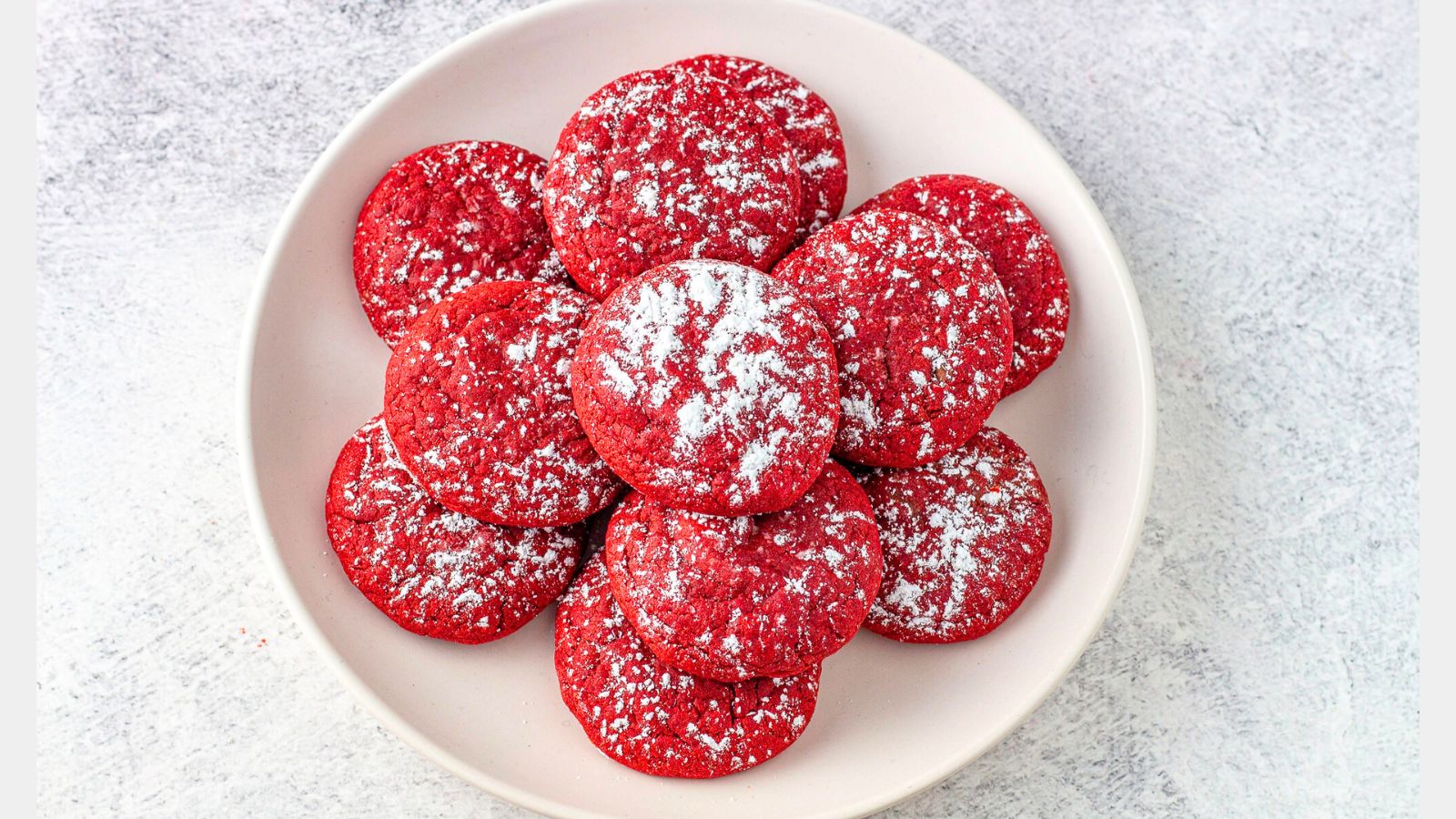 Stack of red velvet cookies on a plate