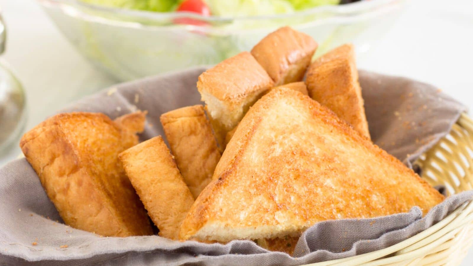 Thick slices of toasted bread in a basket