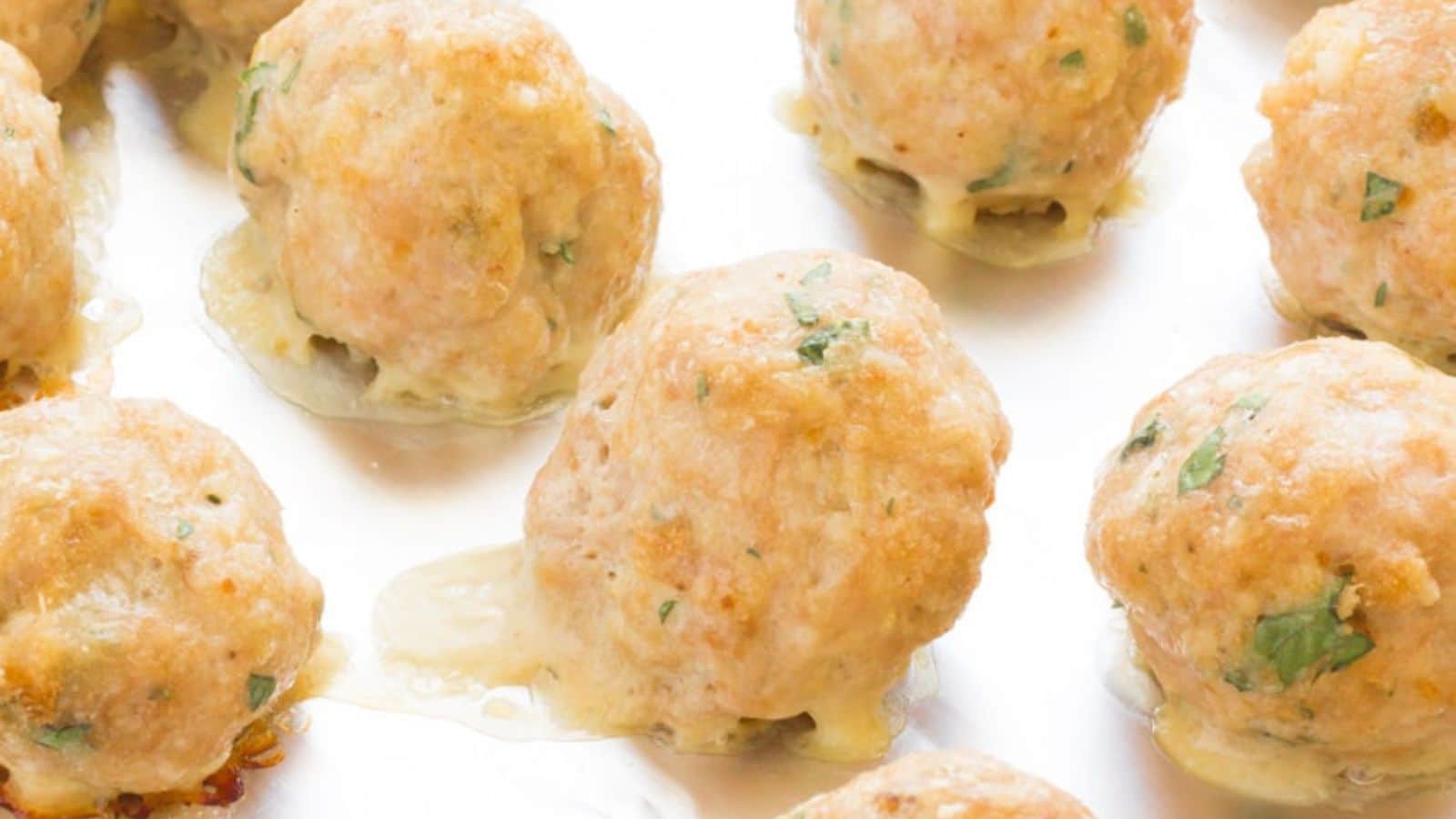 Baked turkey meatballs on a baking sheet