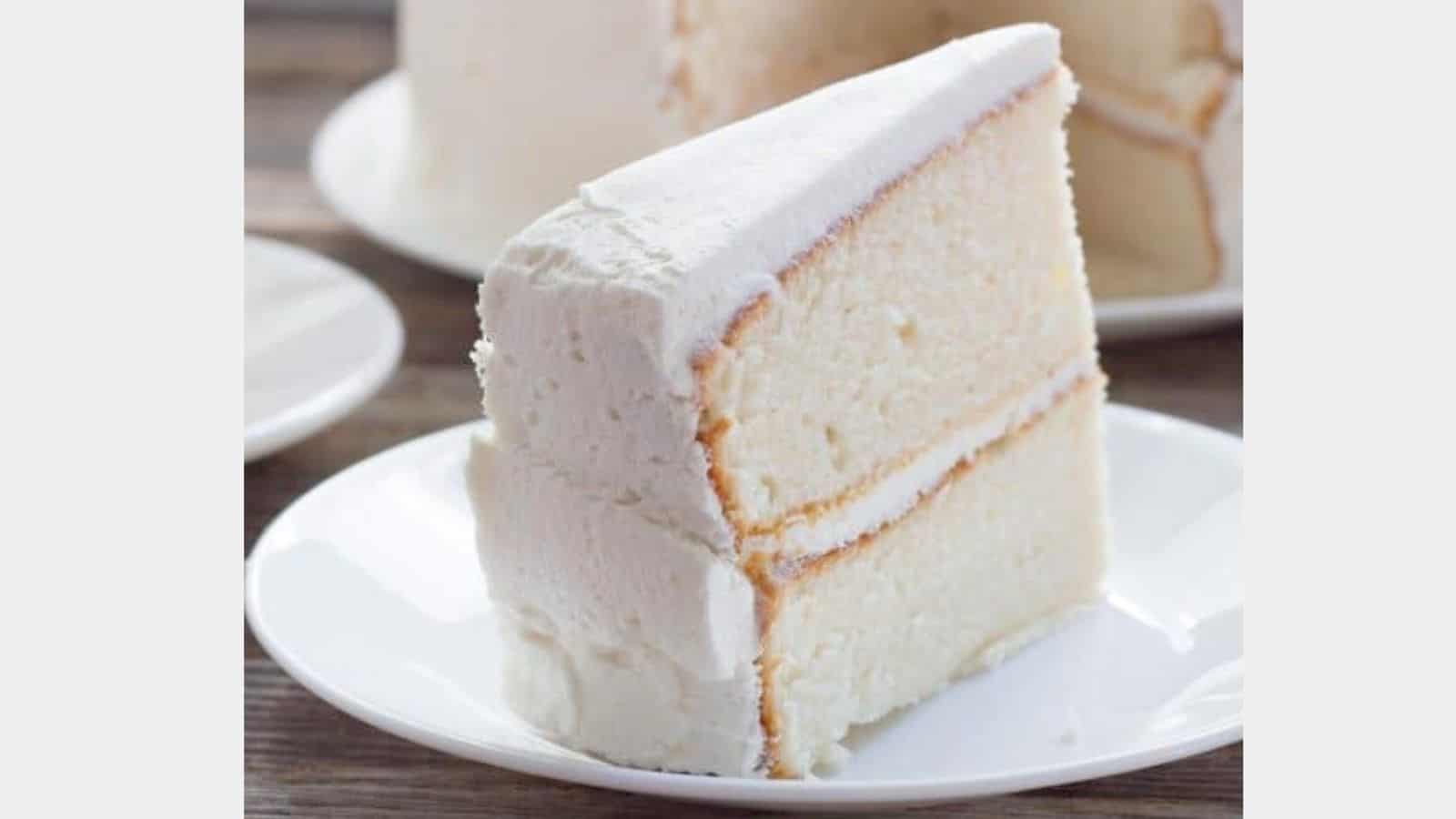 White cake slice on a plate