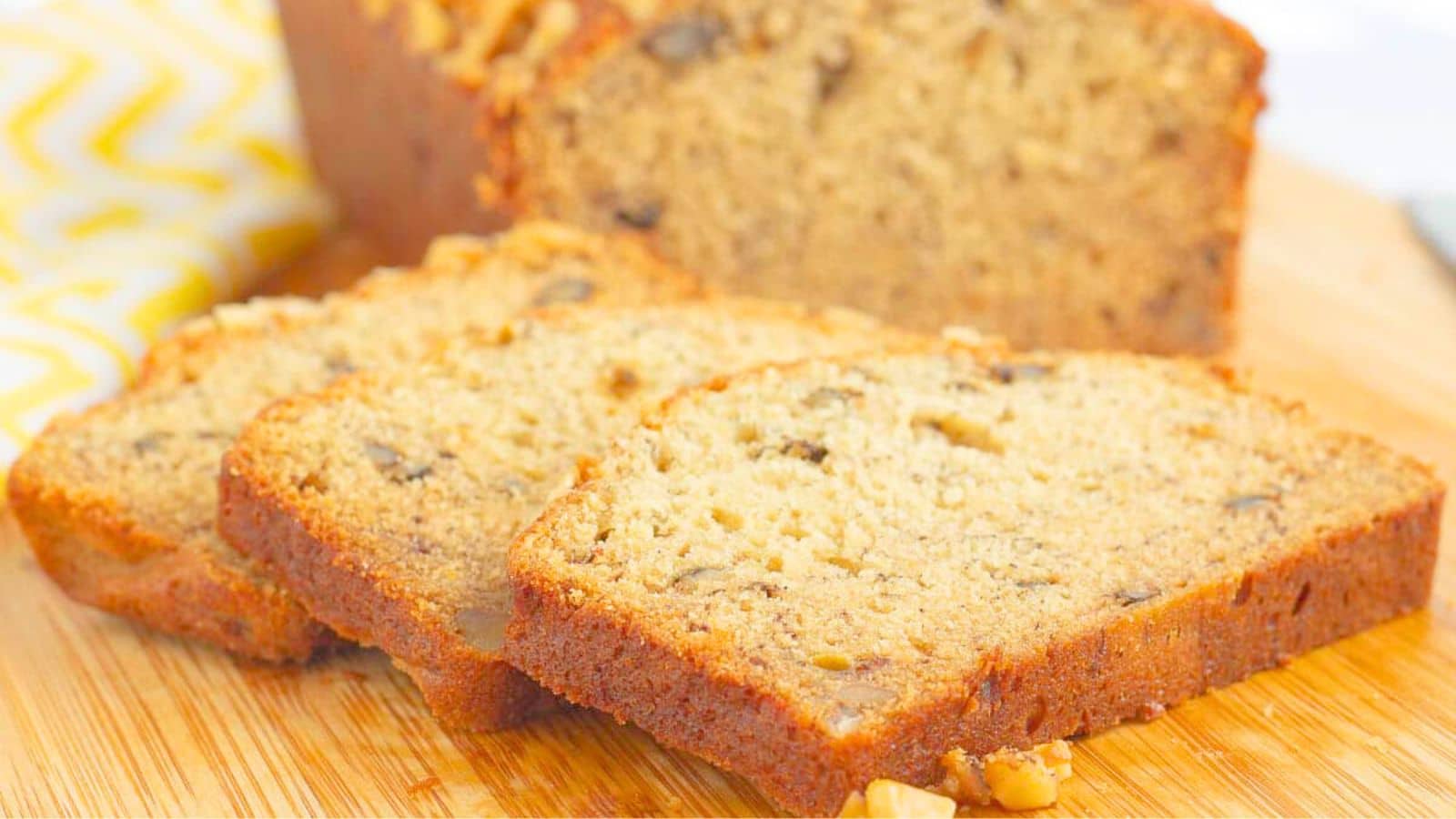 Sliced banana bread on a cutting board