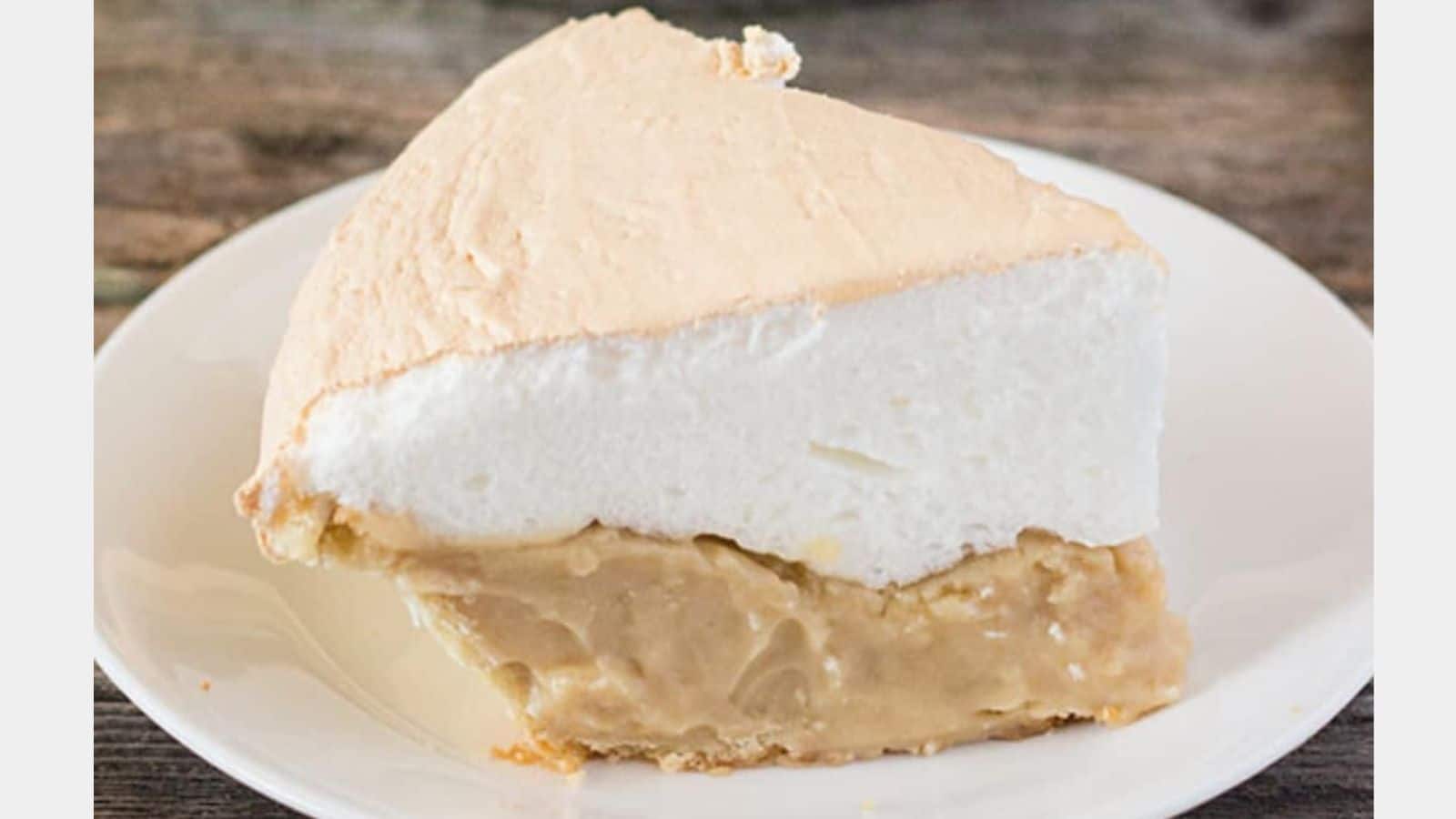 Slice of butterscotch pie with meringue topping