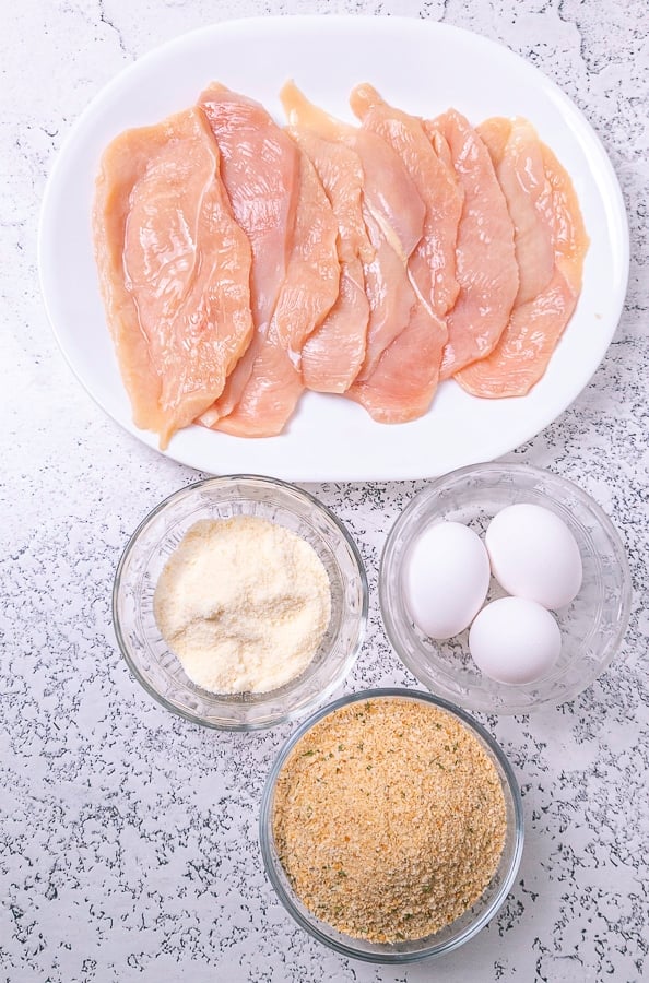 chicken cutlets parmesan cheese eggs and bread crumbs