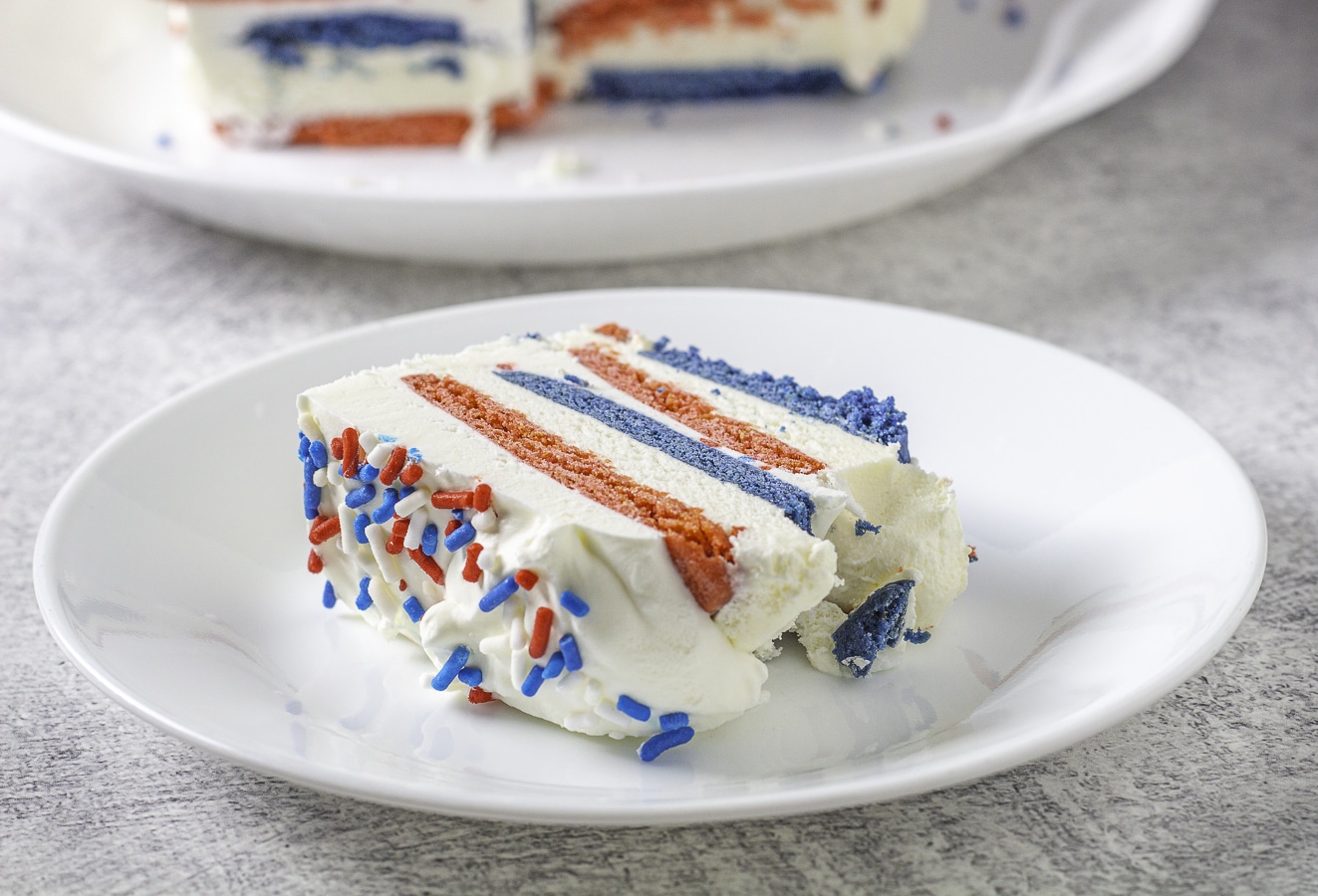Red white and blue cake slice on a plate