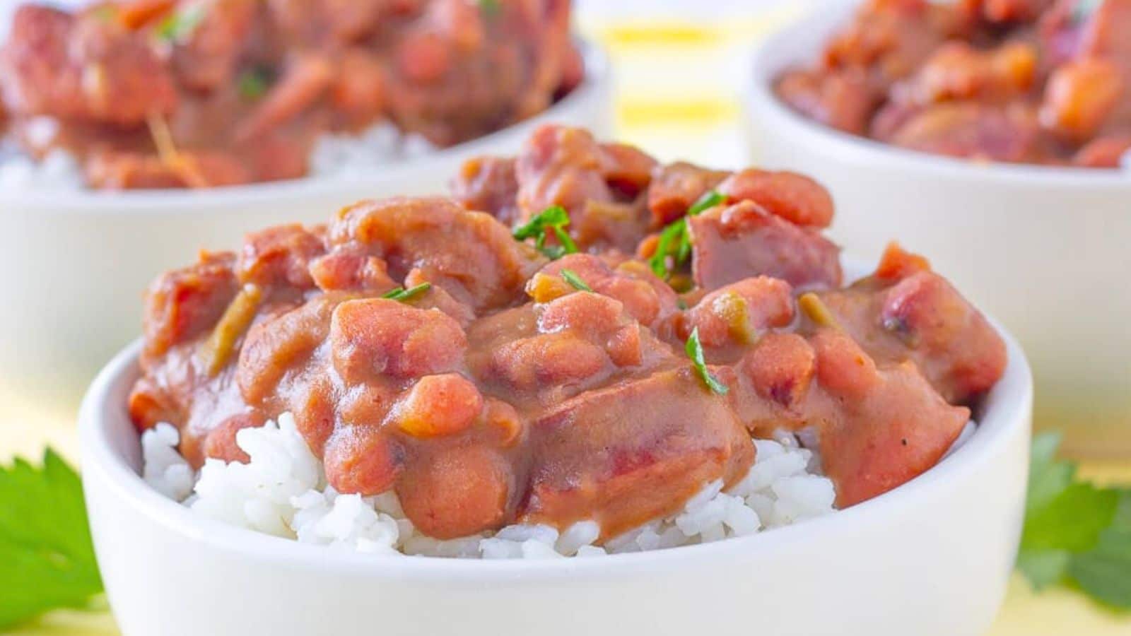 Beans on top of rice in bowl