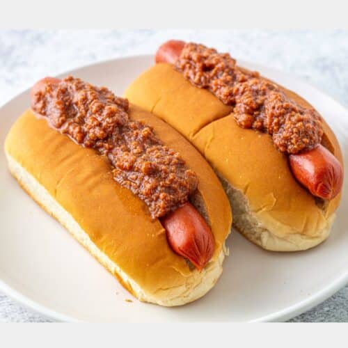 Hot dogs covered with sauce