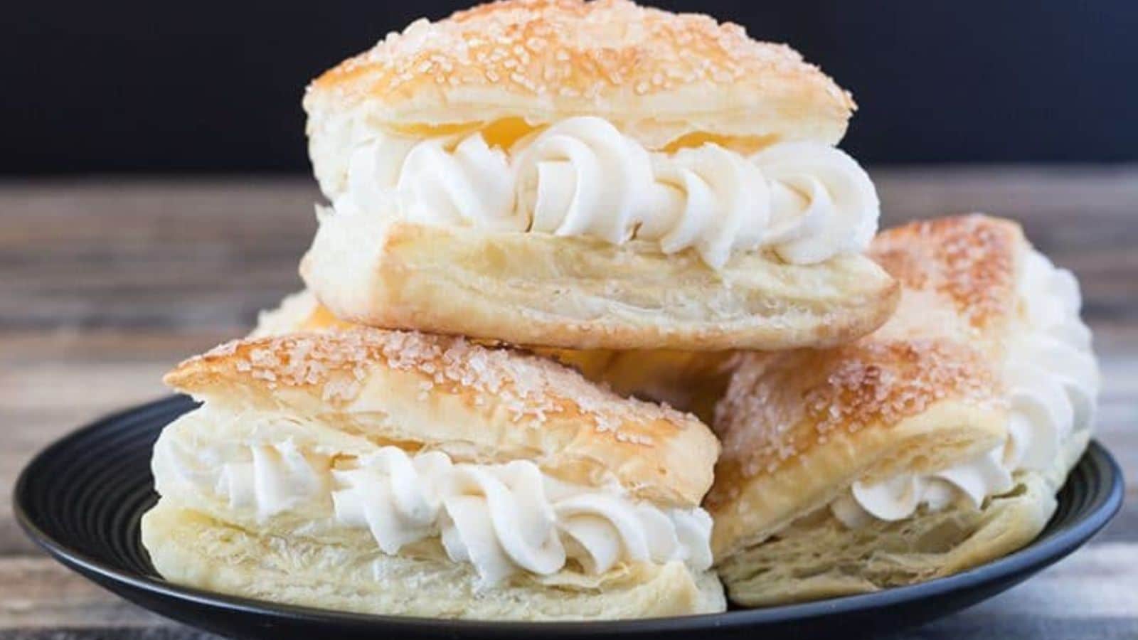 stacked puff pastry squares with cream horn filling