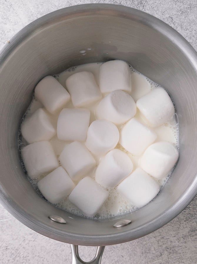marshmallows and milk in a pan