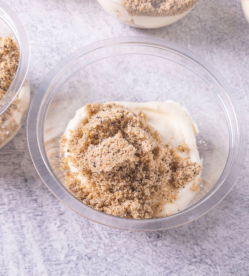 Pudding in a cup covered with crushed cookies