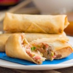 BBQ pork egg rolls on a plate