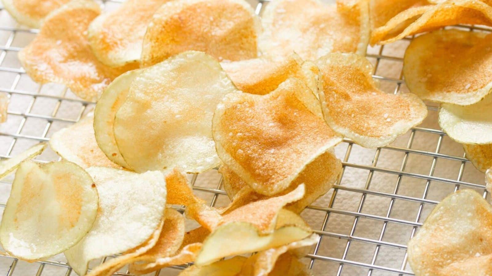 Homemade potato chips on a cooking rack