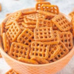 Ranch pretzels in a peach colored bowl
