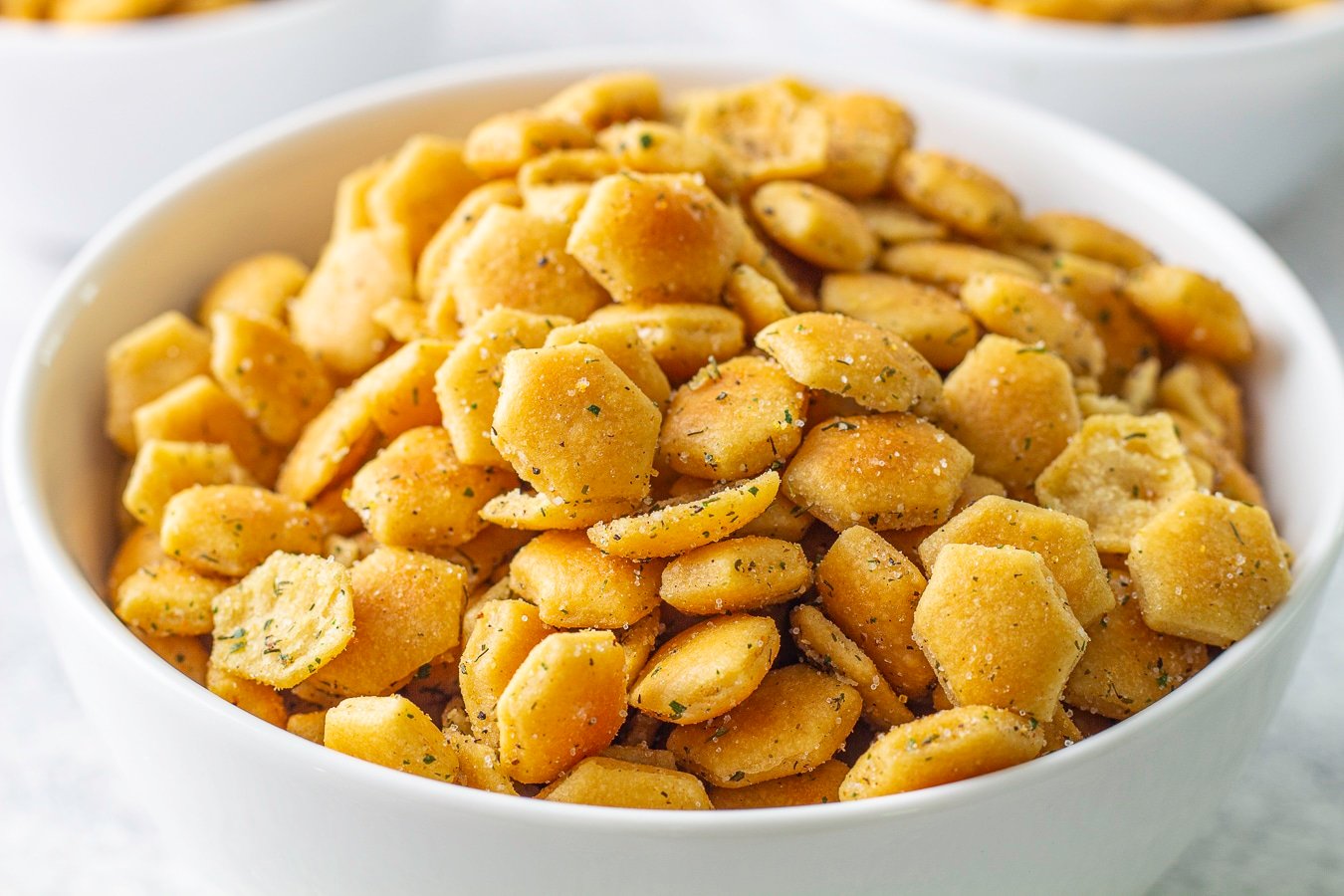 Up-close ranch oyster crackers in a bowl