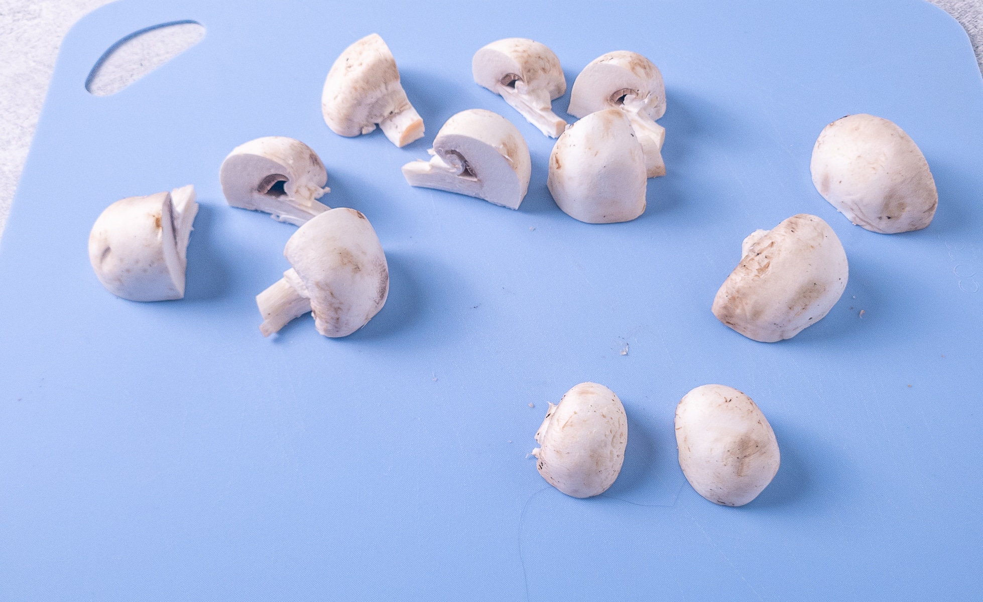 Mushrooms cut into manageable pieces