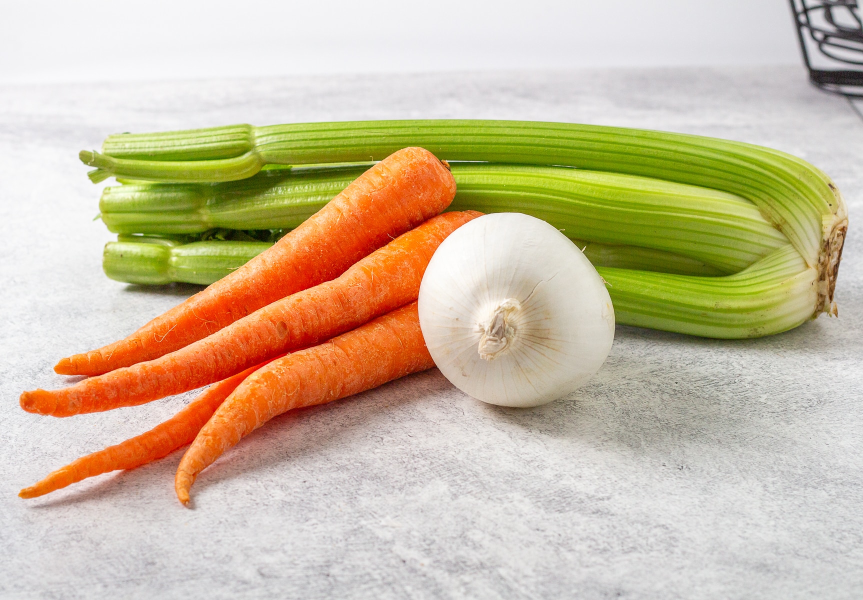 Celery, carrots, and an onion