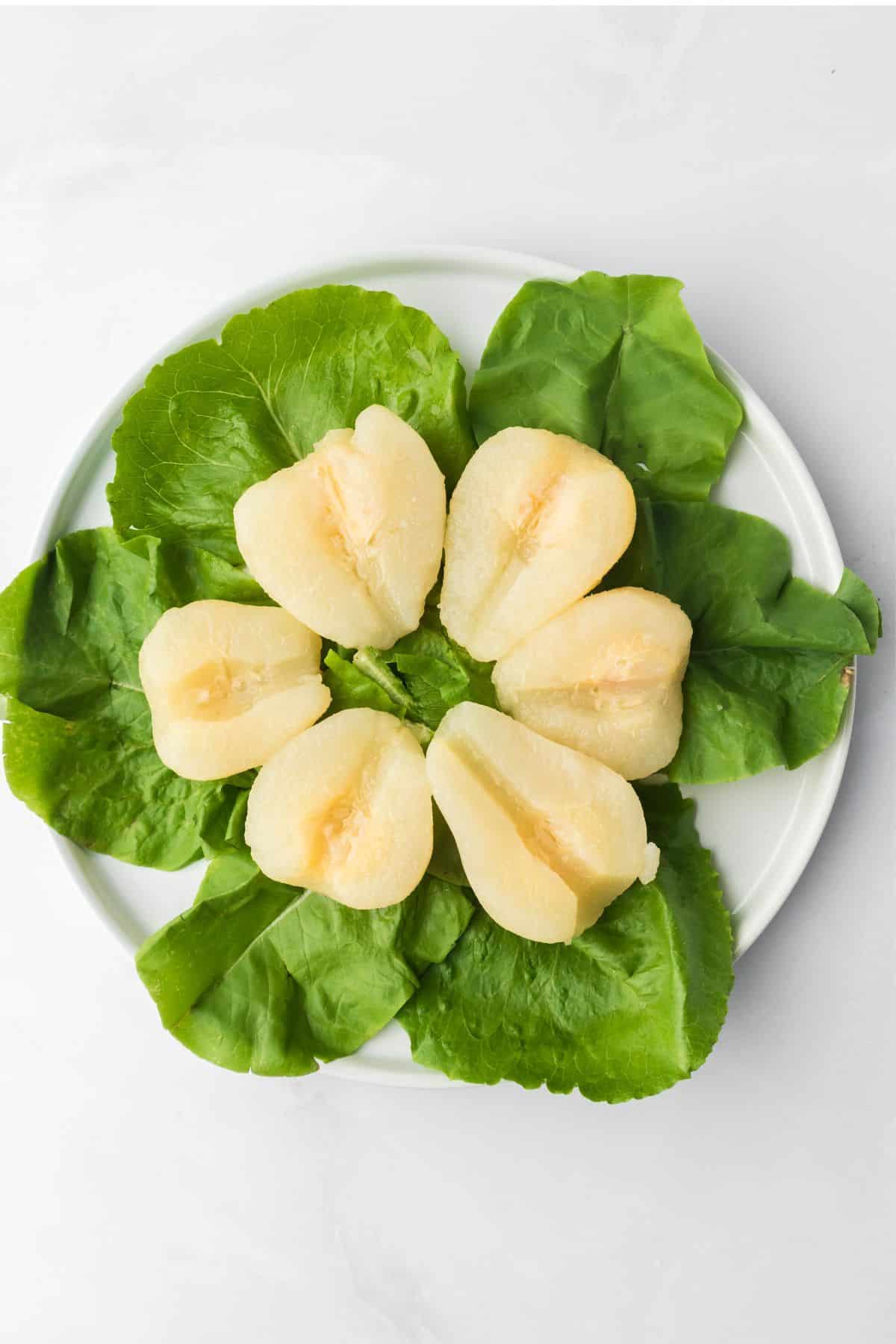 pear halves on lettuce