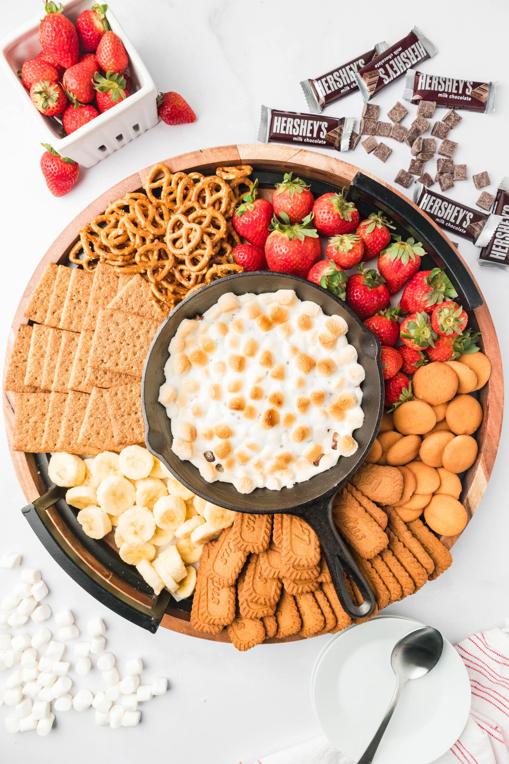 Smores dip on a dessert charcuterie board
