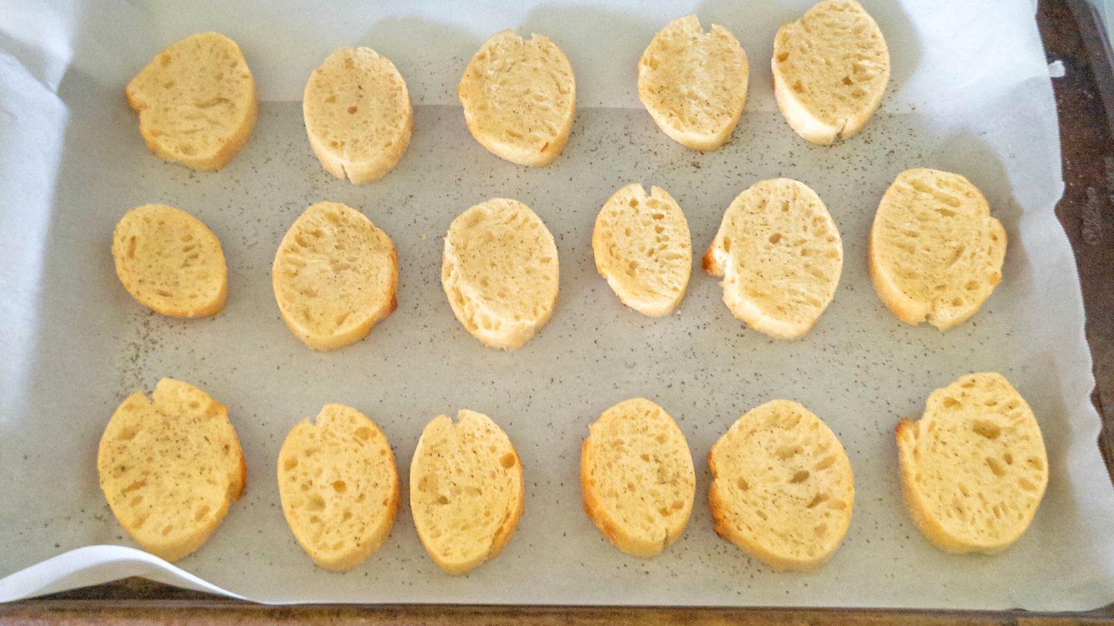 bread coated with oil salt and pepper
