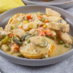 chicken pot pie filling over biscuits