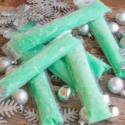 Jack frost freezer pops surrounded by silver ornaments and snowflakes