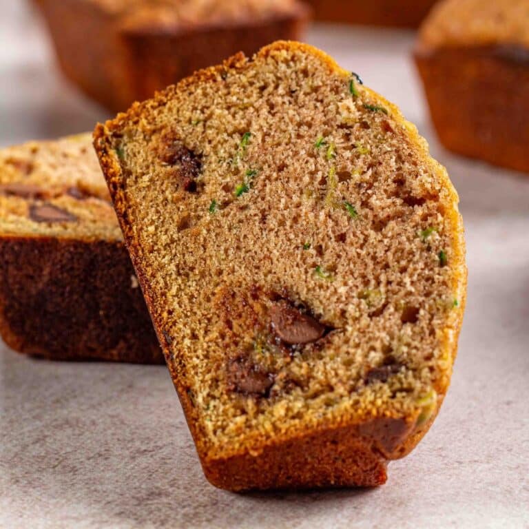 mini loaf of zucchini bread with chocolate chips sliced in half